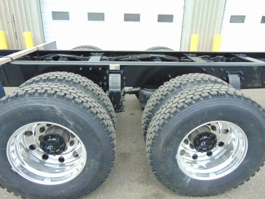 NEW – PETERBILT 348 CHASSIS – CUMMINS 390 HP – AUTO 8LL 7