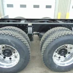NEW – PETERBILT 348 CHASSIS – CUMMINS 390 HP – AUTO 8LL 7