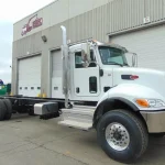 NEW – PETERBILT 348 CHASSIS – CUMMINS 390 HP – AUTO 8LL main